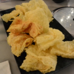 Deep-fried bean curd. Great for holding flavour.